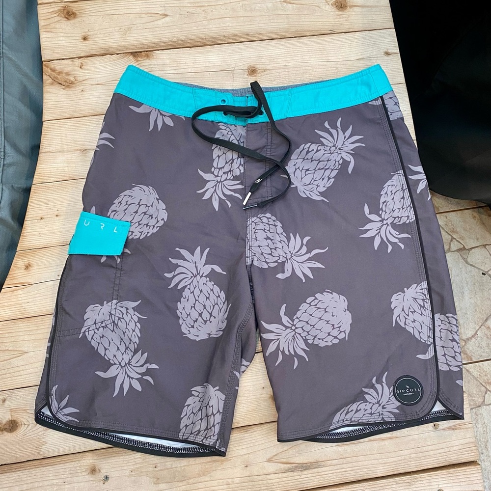 Rip Curl Men ’s floral / pineapple swim shorts